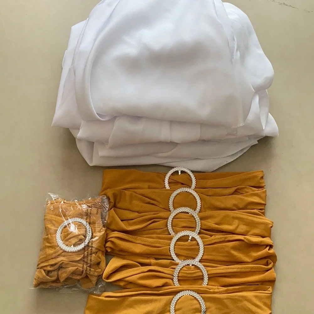 Chair Covers & gold chair bows New Year’s Eve, wedding, graduation, decor